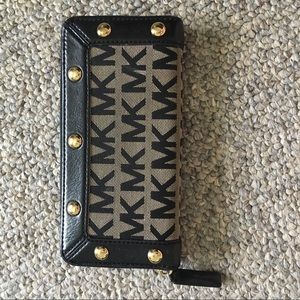 Michael Kors signature studded long wallet.